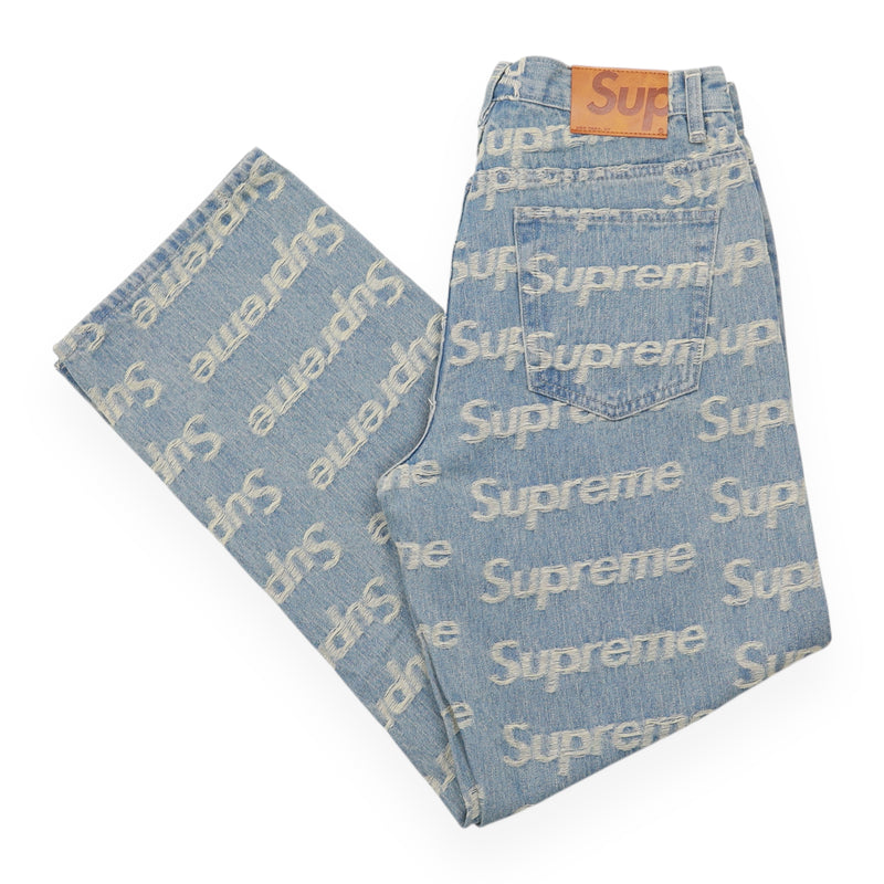 Supreme Frayed Logo Denim Trousers in Blue, front