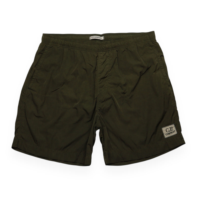 C.P. Company Nylon Patch Logo Swim Shorts in Khaki Green, front
